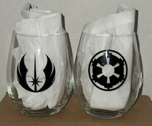 Embrace the duality of the Force with this striking set of two (2) Star Wars-the